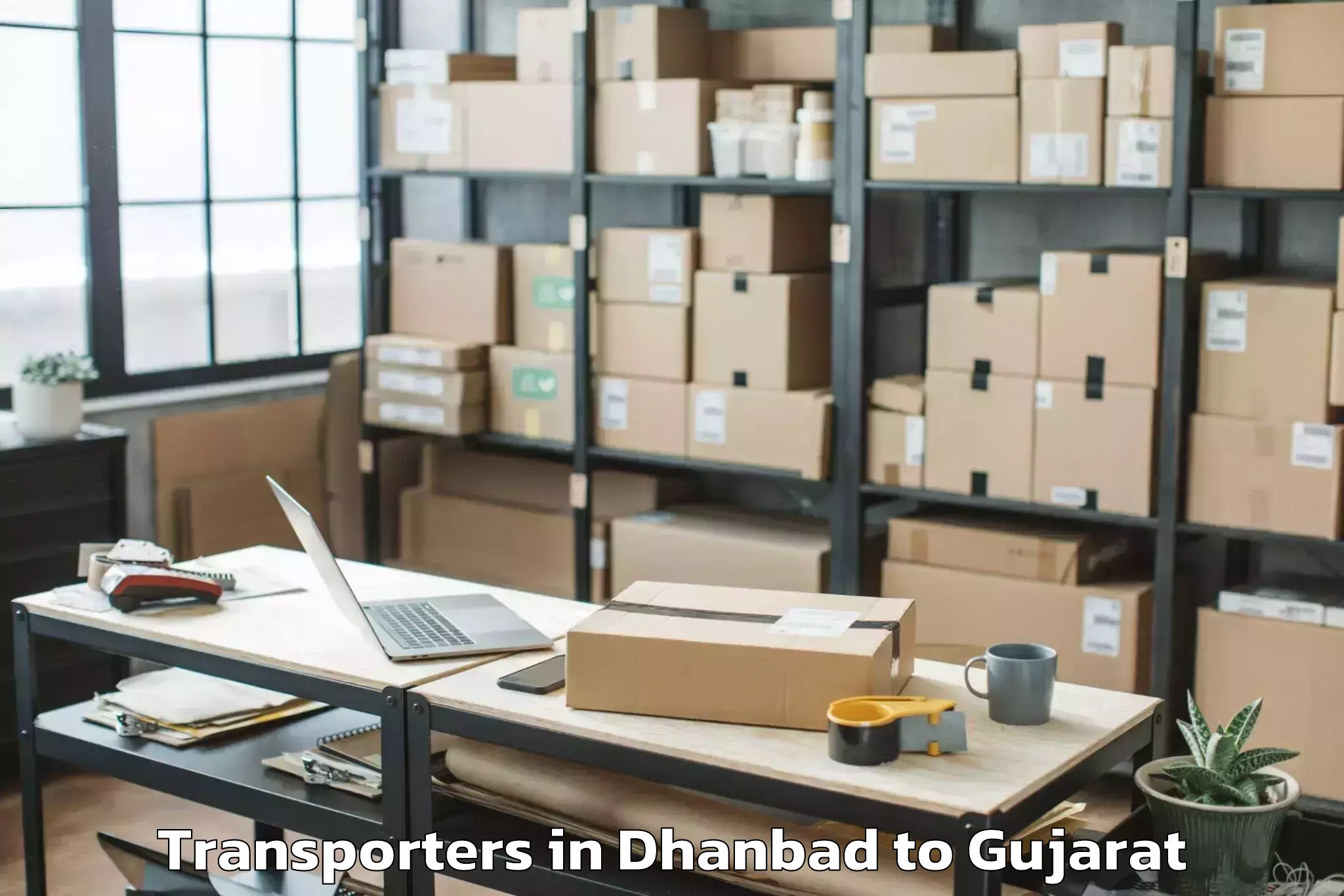 Top Dhanbad to Surat Transporters Available